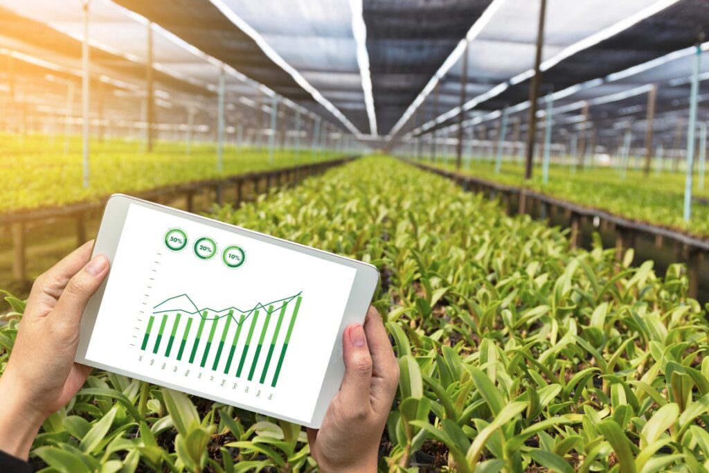 agriculture technology concept man Agronomist Using a Tablet in an Agriculture Field read a report agriculture technology concept man Agronomist Using a Tablet in
