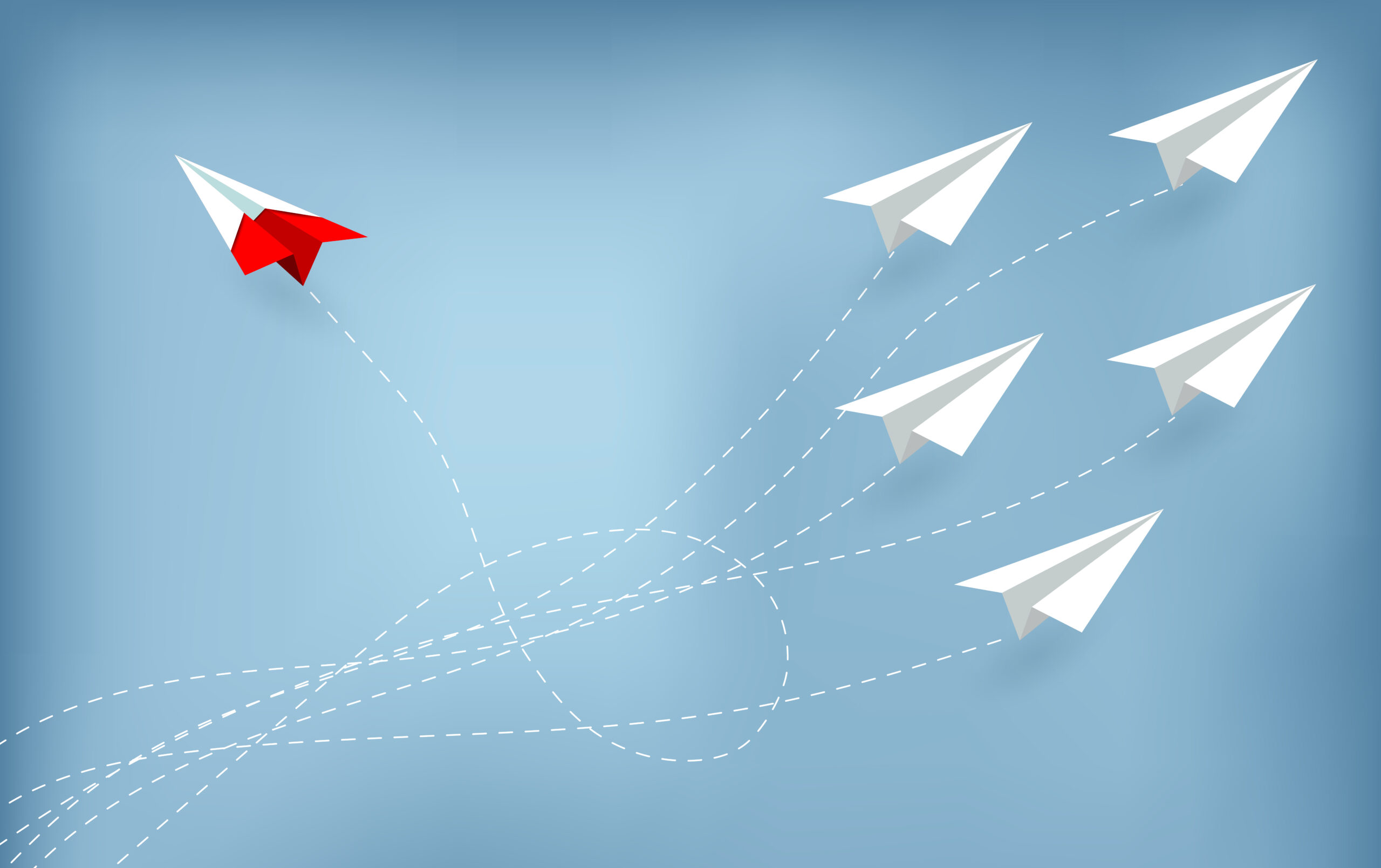 Red paper plane changing direction from white. new idea. differe